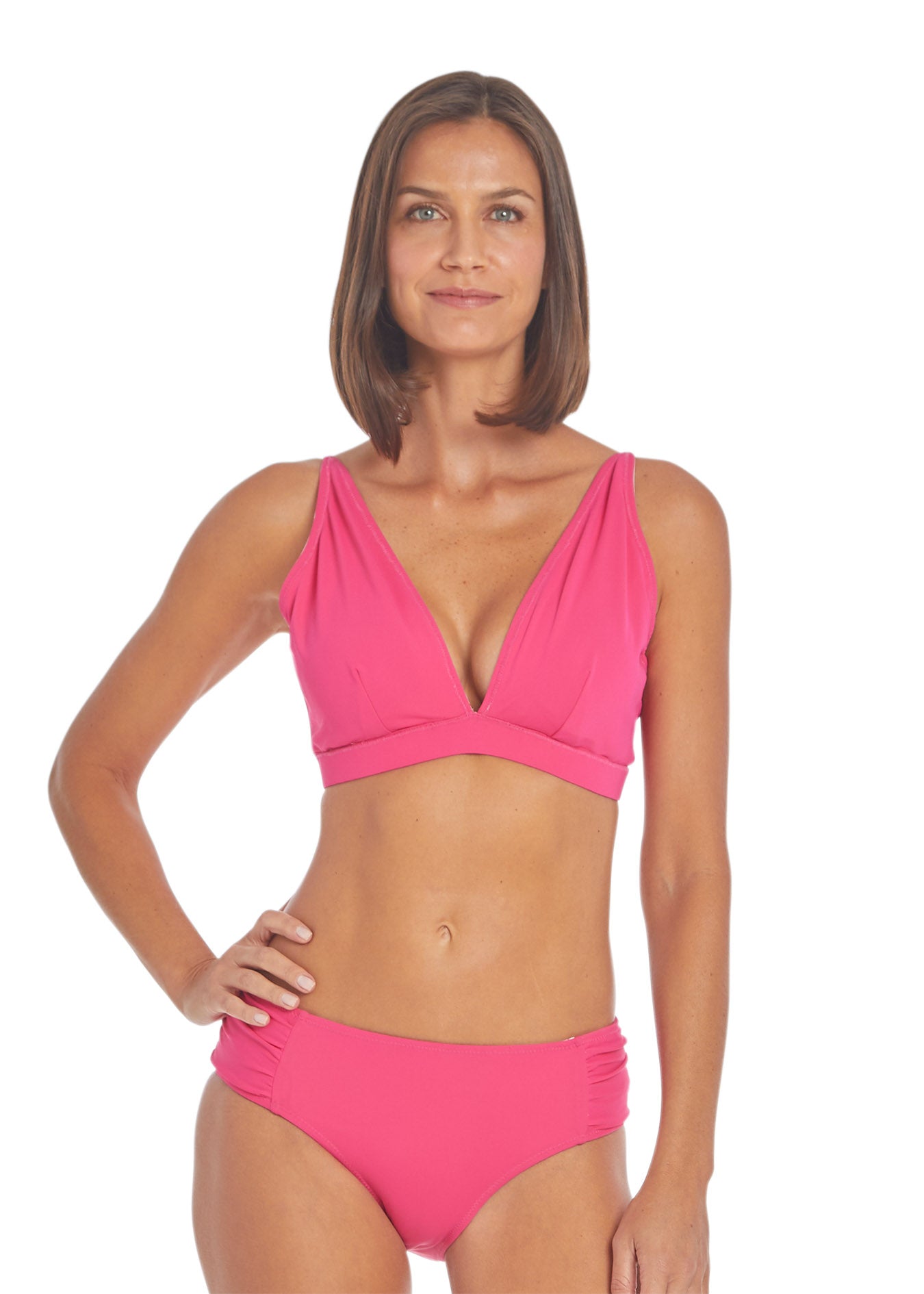 Woman wearing Tulum Reversible Triangle Bikini Top pink side and Tulum Reversible Bikini Bottom pink side