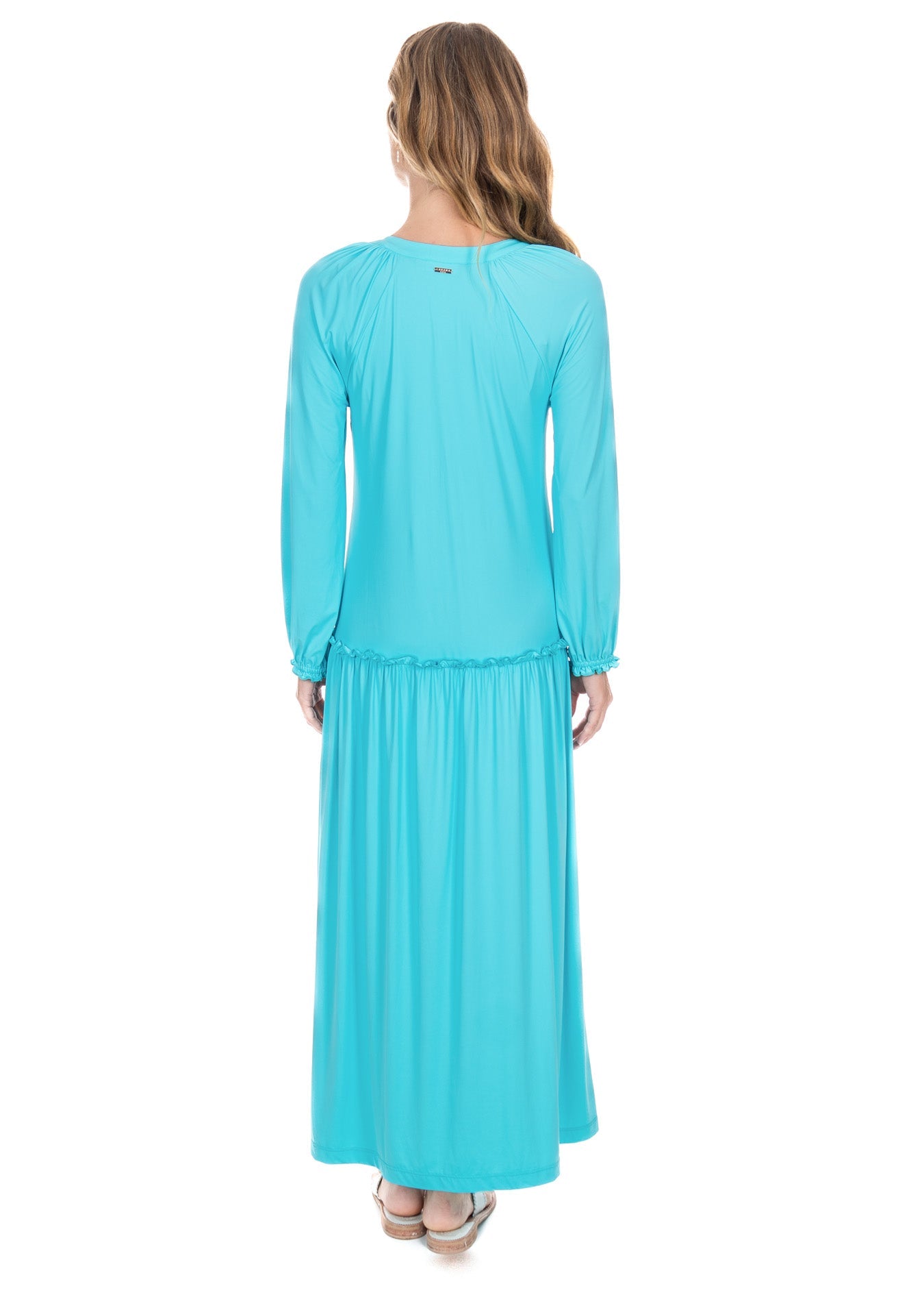 The back view of the UPF50+ Cabana Life Aqua Embroidered Tunic Maxi Dress showing the tunic cut and the flowing hem. 
