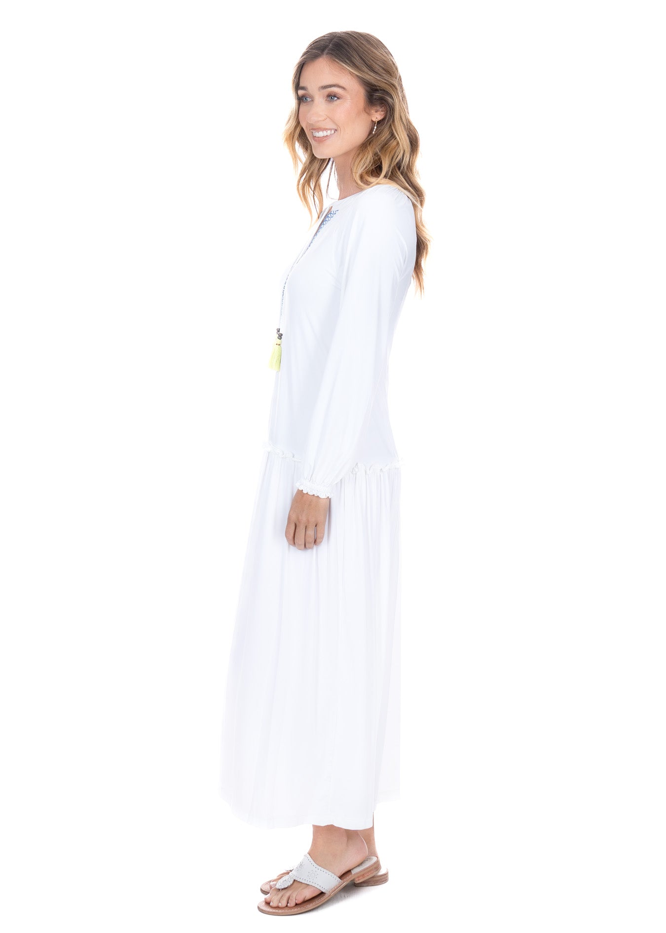 A side view of the Sun Protective Cabana Life White Embroidered Tunic Maxi Dress. 