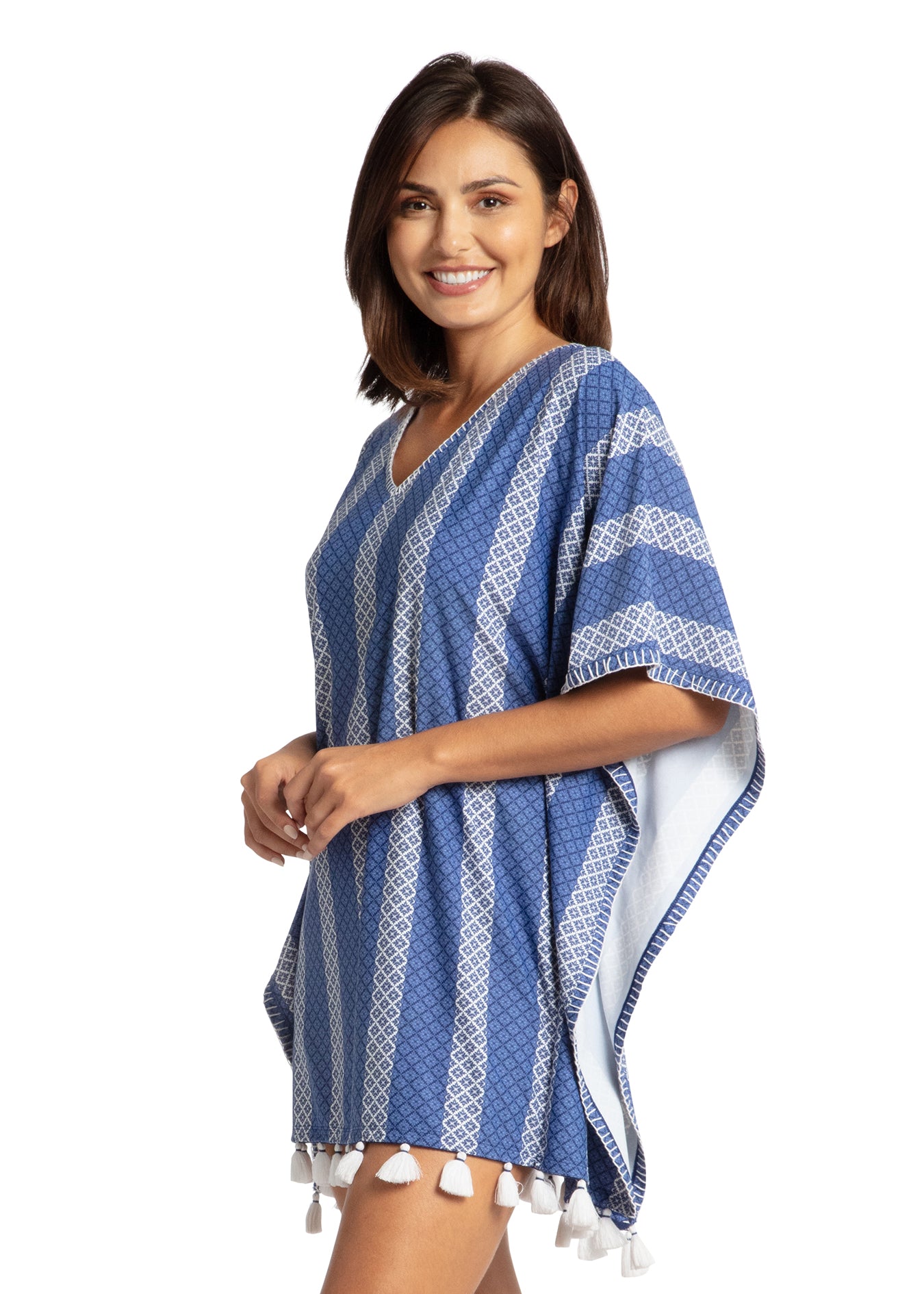 Woman modeling sideof Fisher Island Embroidered Cover Up.