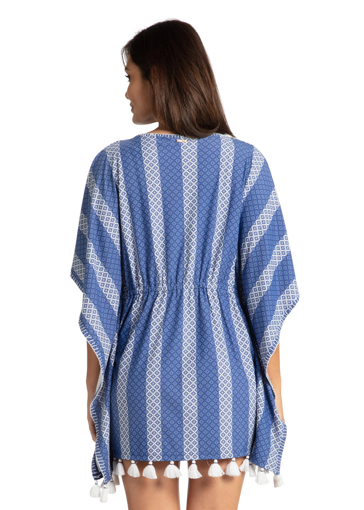 Woman modeling back of Fisher Island Embroidered Cover Up.