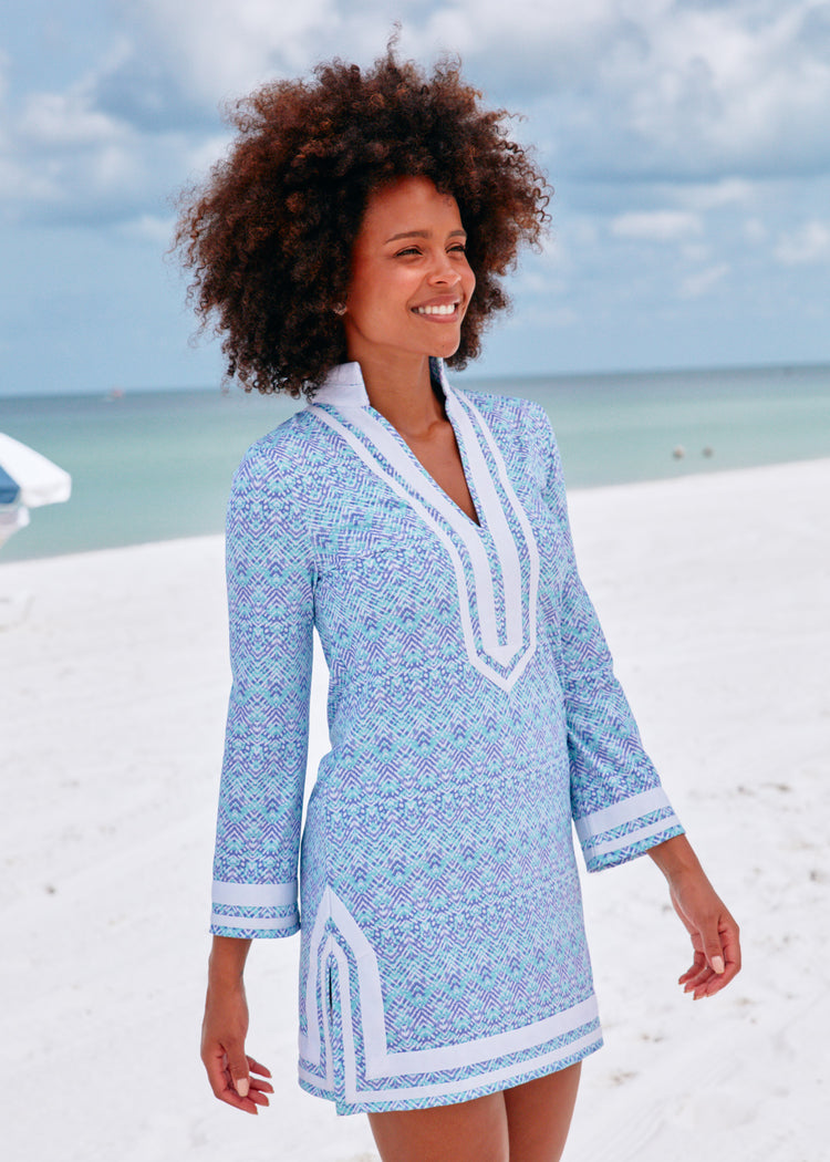 Woman on beach wearing Naples with white trim terry tunic.