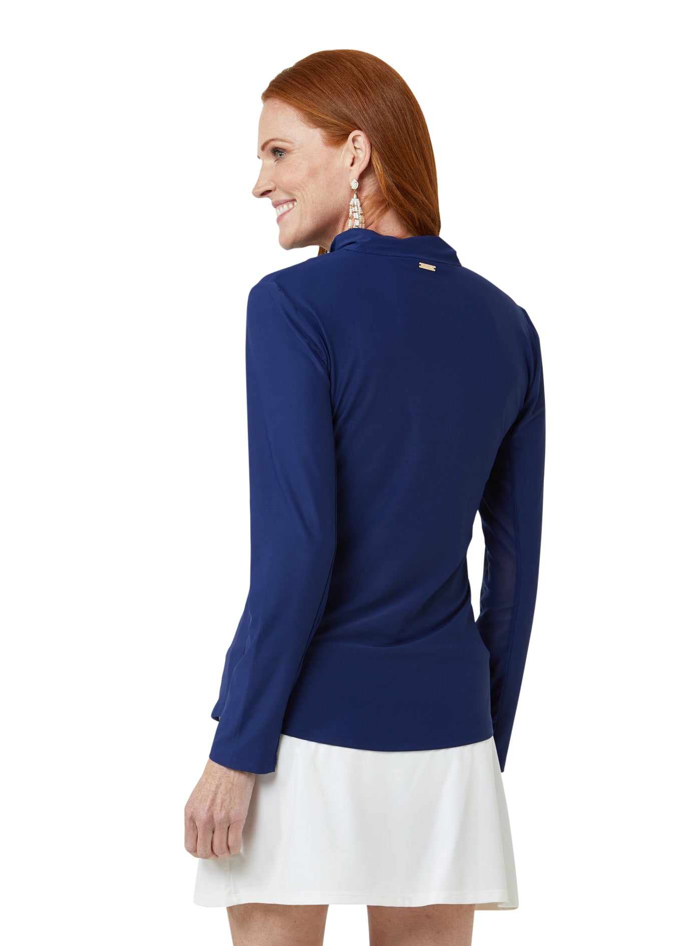 Woman wearing Navy Sport Zip Polo and White Classic Swim Skirt