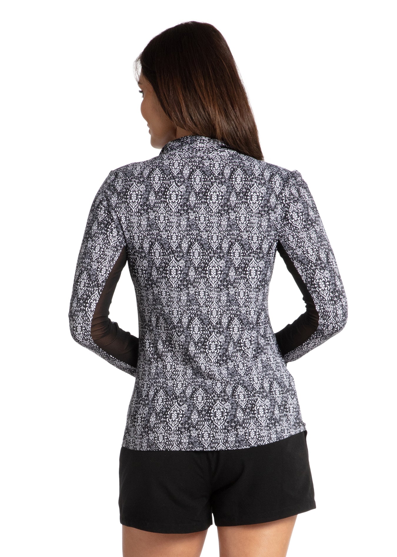 Woman wearing Sanibel Sport Zip Polo.