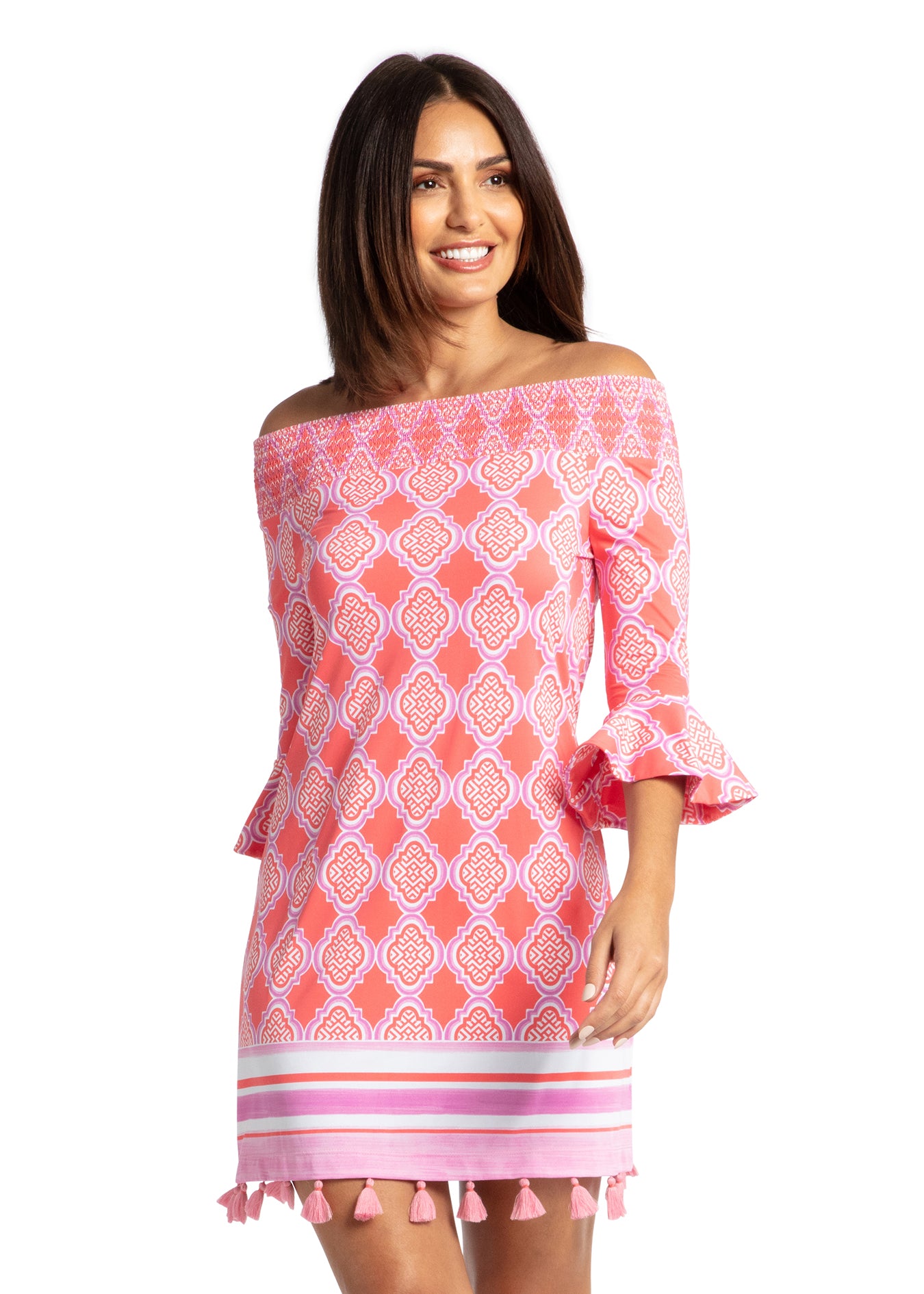 Woman modeling front of Coral Geo Off The Shoulder Dress.