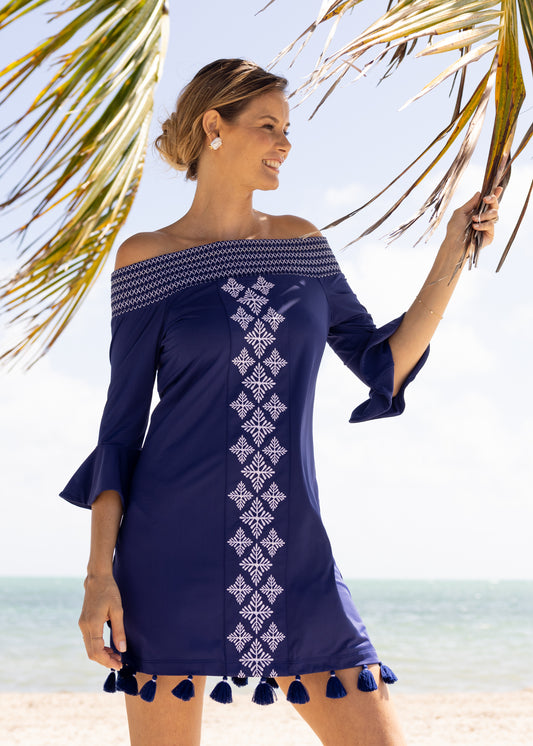 Woman wearing Navy Embroidered Off The Shoulder Dress on the beach
