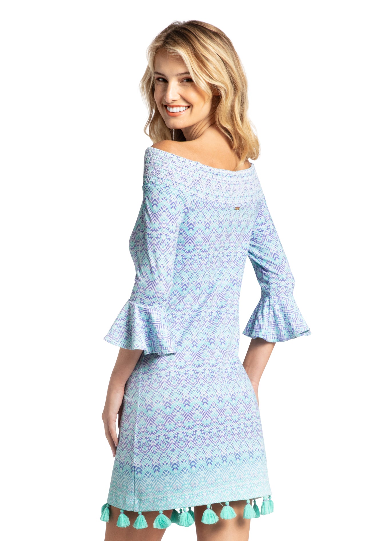 Woman wearing Naples off the shoulder dress.