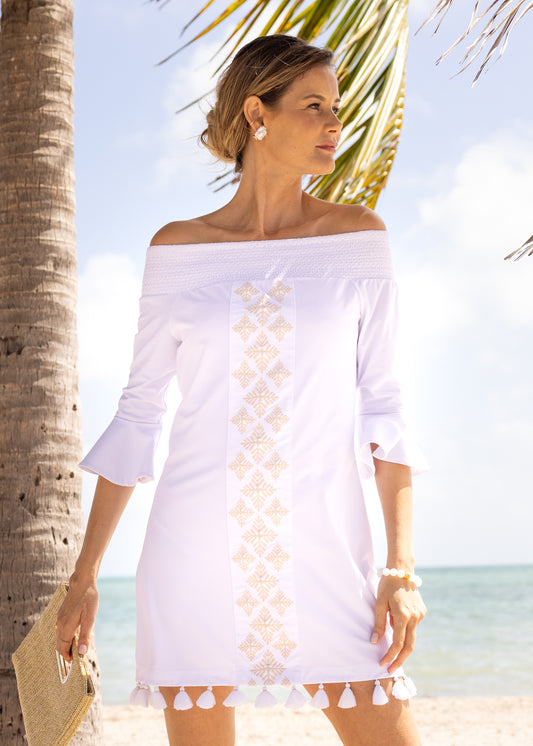 Woman wearing White Embroidered Off The Shoulder Dress on the beach