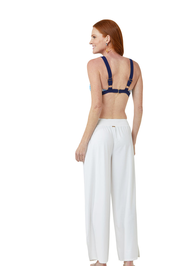 Woman wearing Essentials White Palazzo Beach Pants and Seascape Bikini Top