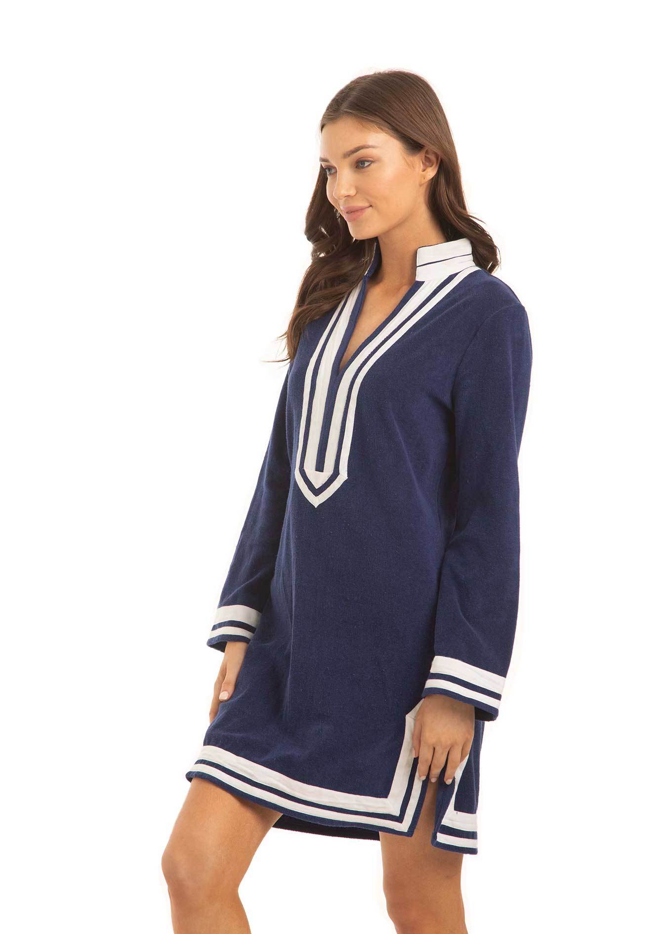 The side of a brunette woman wearing the Cabana Life sun protective Navy/White Terry Tunic.