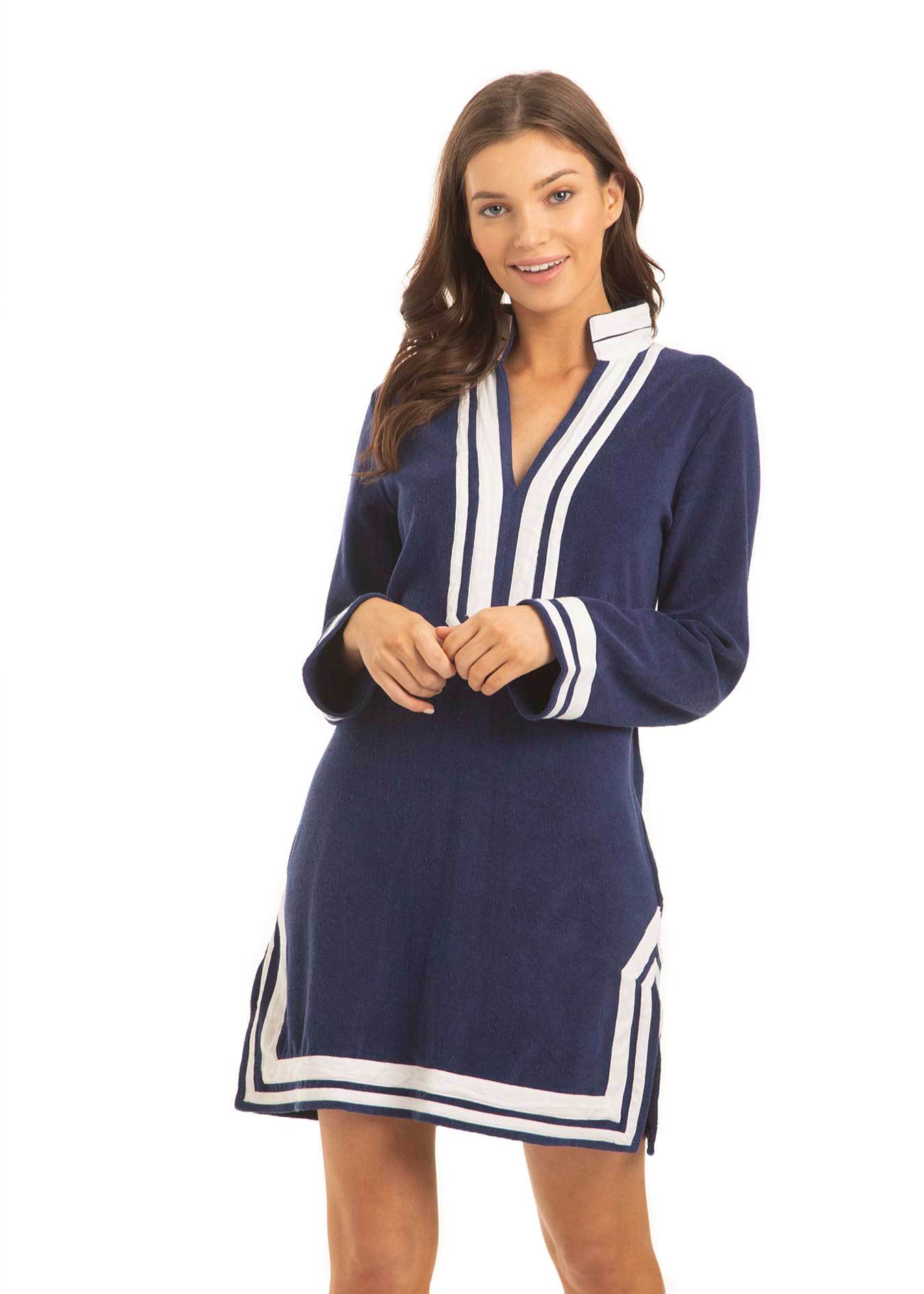 A brunette woman wearing the Cabana Life sun protective Navy/White Terry Tunic.
